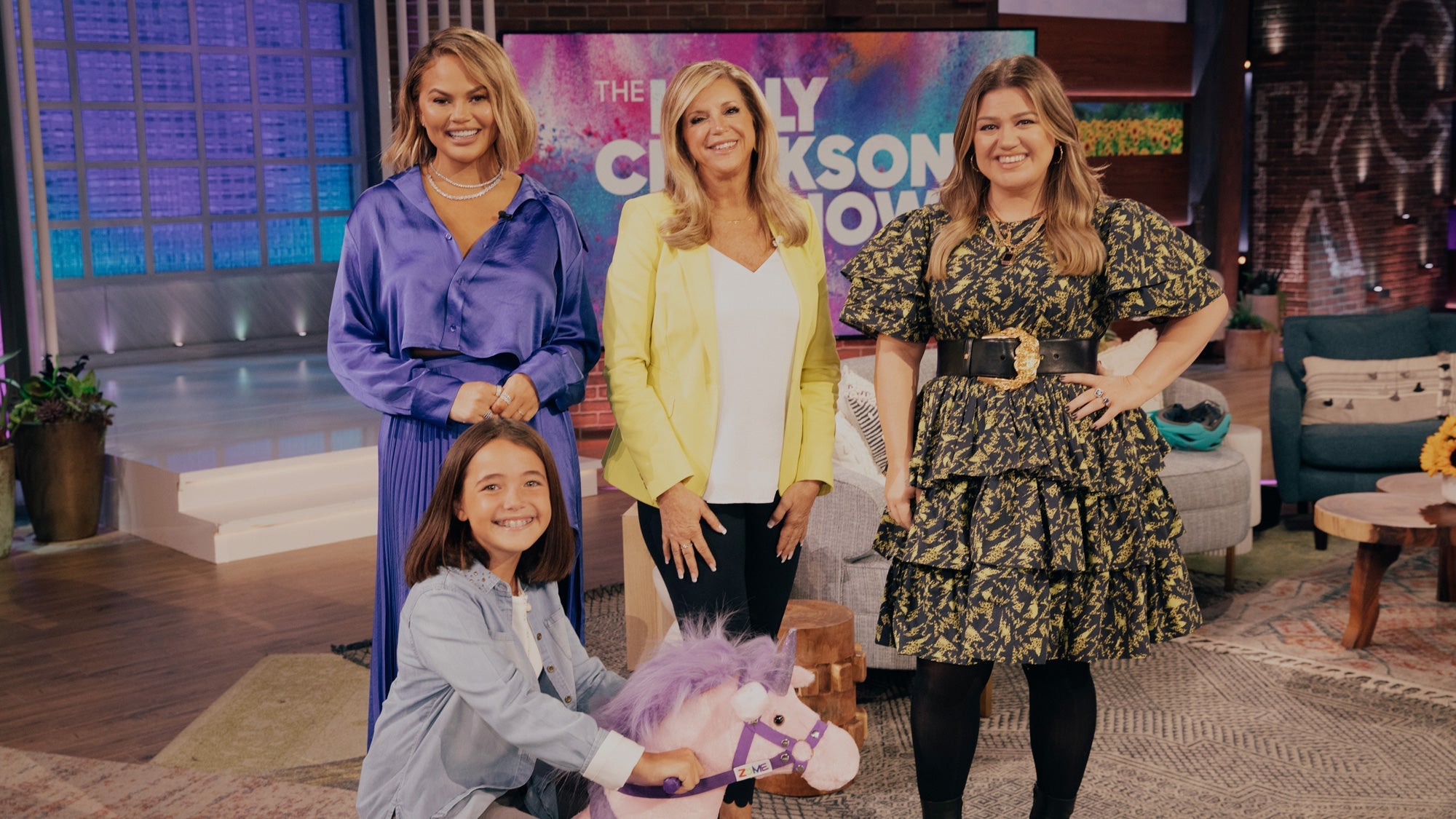 Power Pony inventor with hosts on The Kelly Clarkson Show.