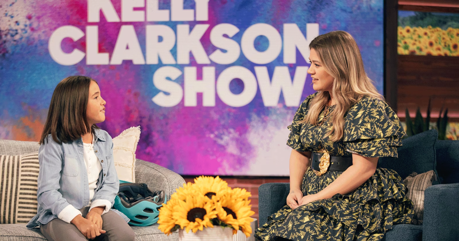 Kelly Clarkson interviewing young Power Pony inventor on The Kelly Clarkson Show.